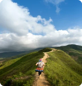 Woman walking on a mountain road counting her steps